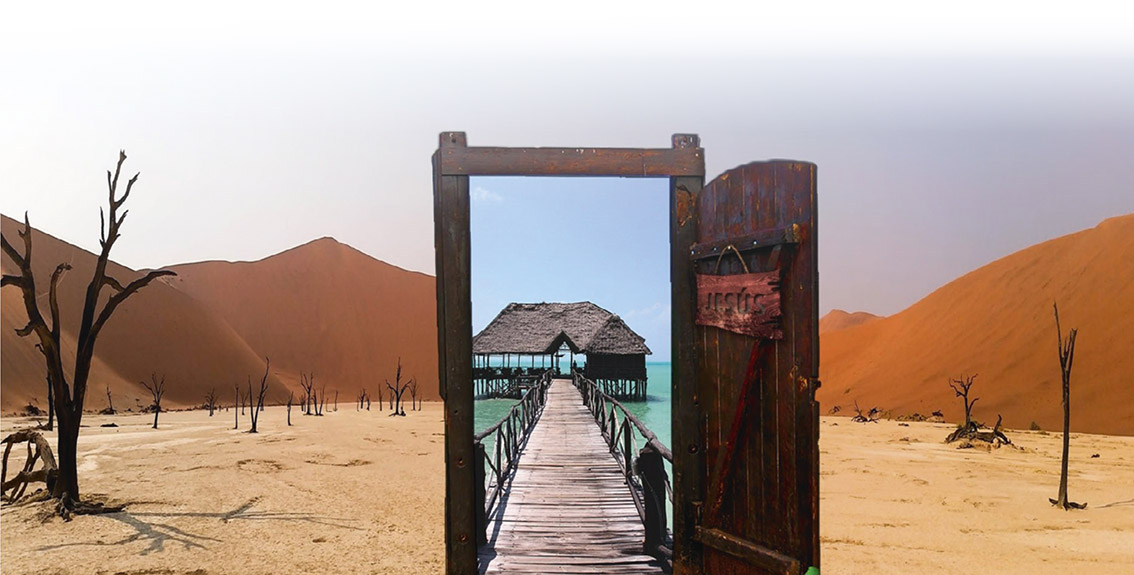 Door in desert opens into paradise photostock art